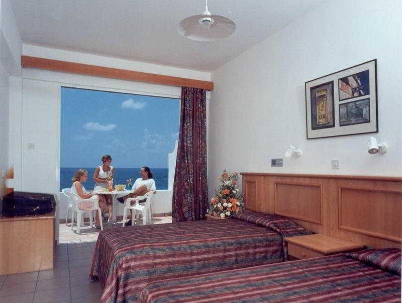 Corallia Beach Hotel Apartments Coral Bay Room photo